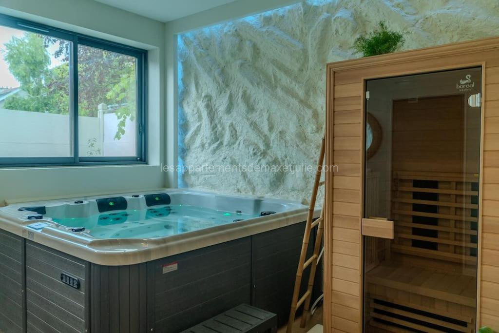 Photo de Le Cozy Reims -Escapade raffinée avec spa privé
