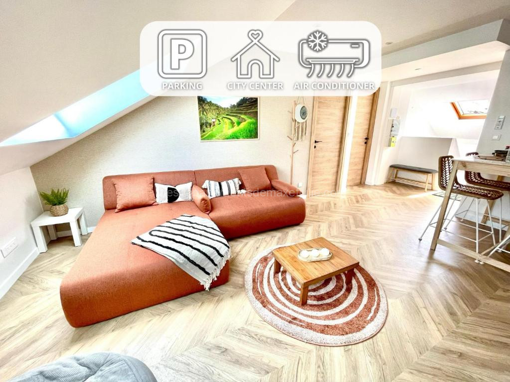 Photo de Appartement climatisé-Centre Ville-Gare