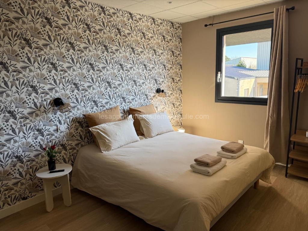 Photo de Suite du Spa 1 - Parking Privé Gratuit