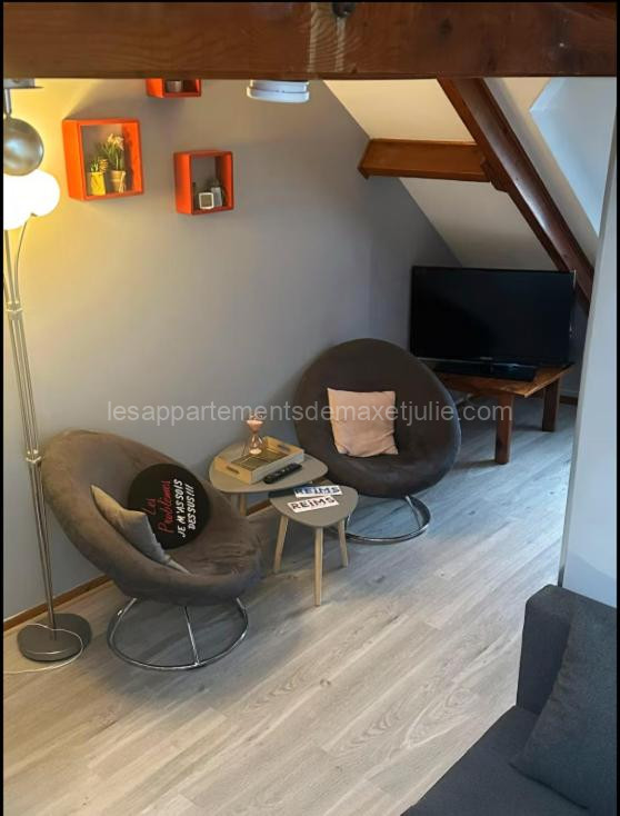 Photo de Appartement Cosy à 2 pas des Caves Basilique