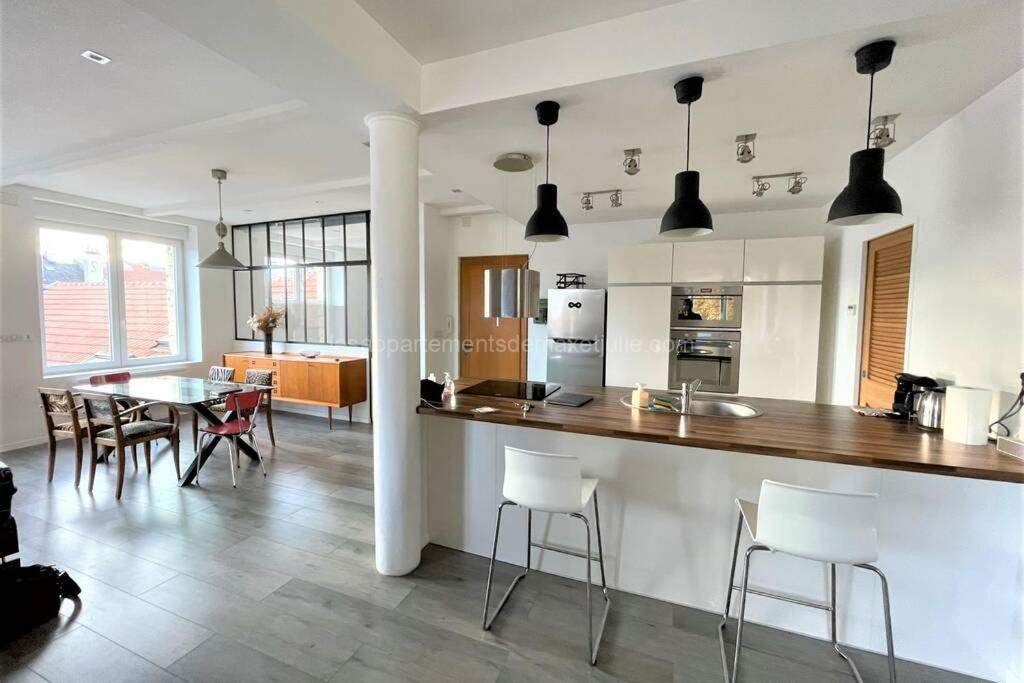 Photo du Superbe Loft 100m2 Proche Cathédrale avec Parking