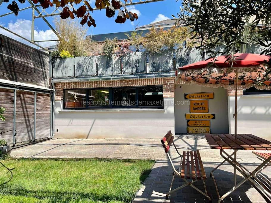 Photo de Rare ! LOFT Atypique Centre-Ville Parking Jardin